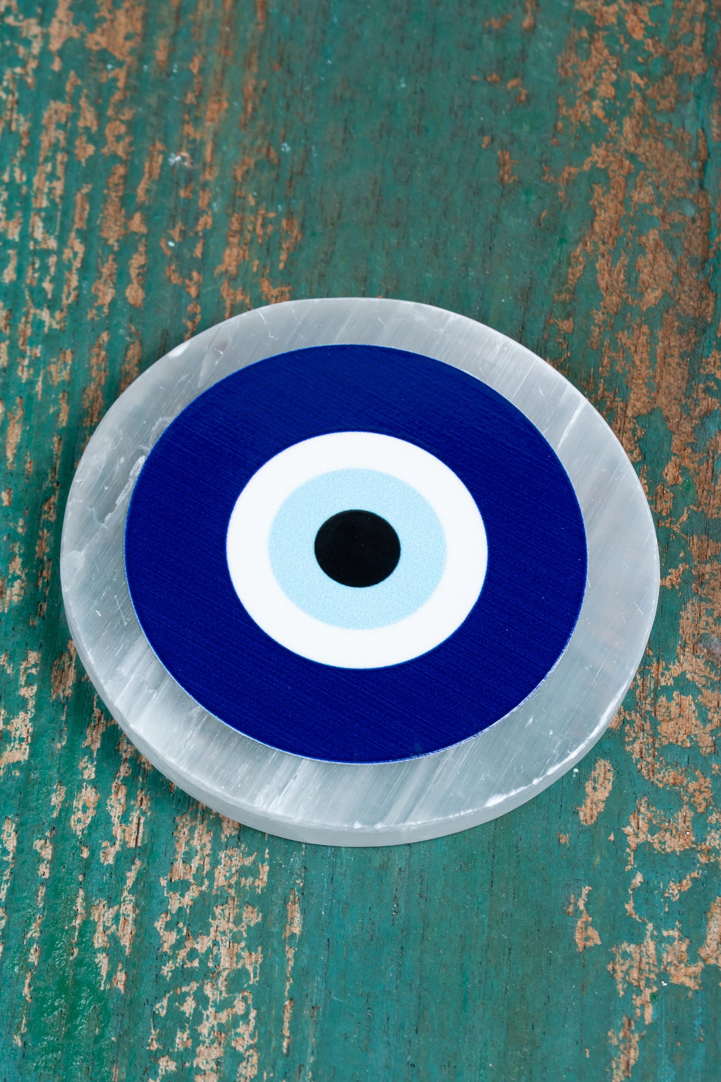 Selenite Charging Plate – 4 Inch Engraved with Evil Eye Symbol