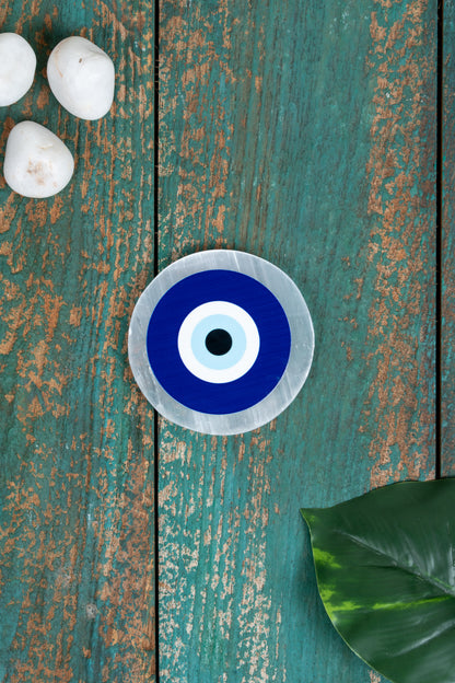 Selenite Charging Plate – 4 Inch Engraved with Evil Eye Symbol