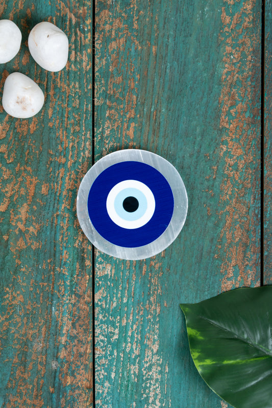 Selenite Charging Plate – 4 Inch Engraved with Evil Eye Symbol